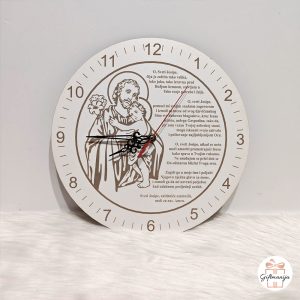 Drveni okrugli zidni sat s ilustracijom Svetog Josipa koji drži malog Isusa i ispisanim tekstom molitve.