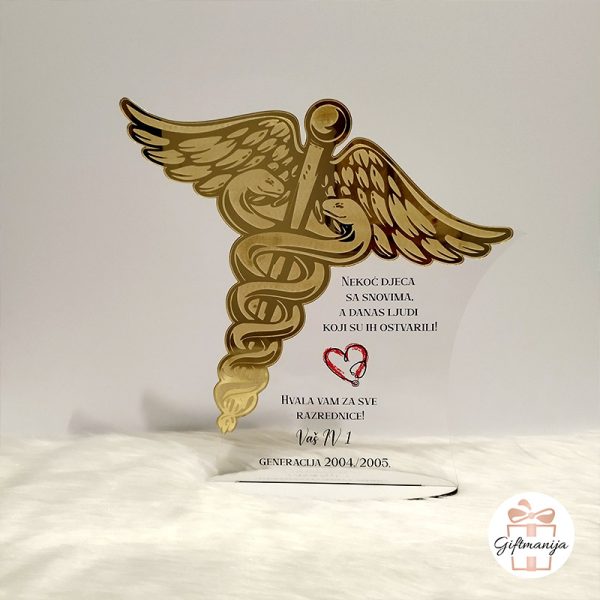 Prozirna akrilna plaketa sa zlatnim medicinskim simbolom kaducejom i personaliziranom porukom poklon za razrednicu medicinska škola